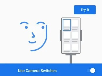 Print do recurso Camera Switch do Android 12 com a ilustração lúdica de um rosto sorrindo ao lado de uma tela de celular. Há os textos em inglês: "Try it" e "Use Camera Switches".